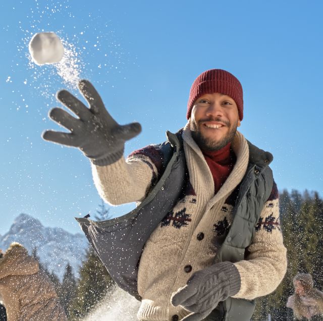 man-throwing-snowball-royalty-free-image-1610455842_ man-throwing-snowball-royalty-free-image-1610455842_